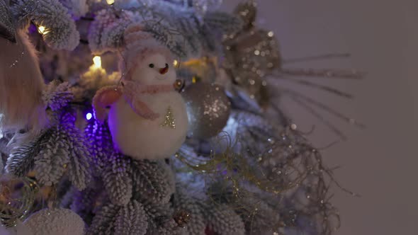 New Year's Toy Snowman on the Christmas Tree