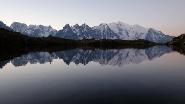 Colourful Sunrise on Chesery Lake in France Alps