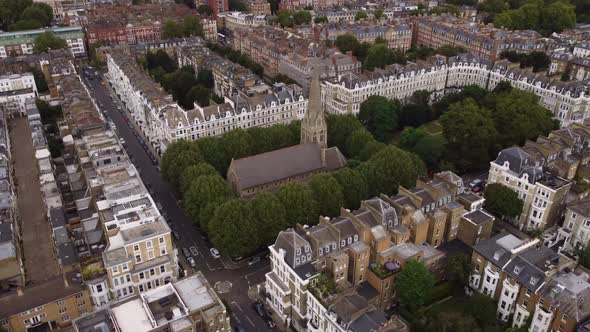 Drone View of St Luke's Earls Court Armed with Trees and Buildings in London