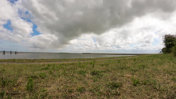 Timelapse of the Langeoog Harbor with a ship leaving alt