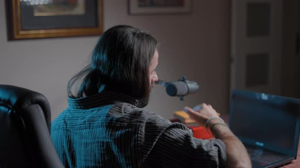 Young Online Teacher Explaining to His Online Student How to Do His Homework Doing a Lot of Gestures alt