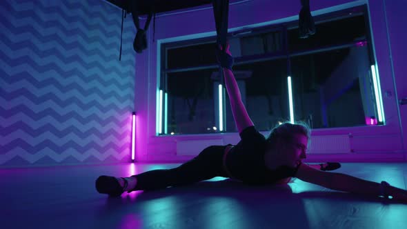 Flexible Woman is Doing Exercises for Stretching Body in Yoga Class Sport and Physical Activity alt