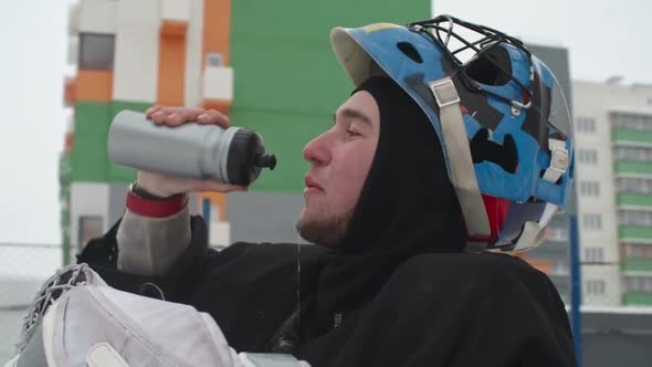 Tired Ice Hockey Player after Drill alt