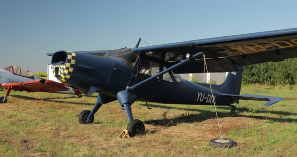 Beautiful Video of an Old Restored Airplane Standing on the Ground alt