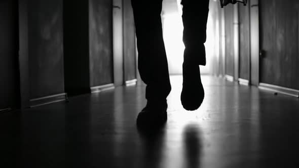 Low-section of Man with Briefcase Walking alt