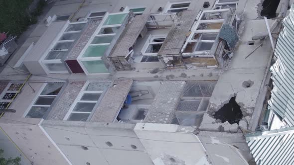 Vertical Video of a Residential Building Destroyed By the War in Ukraine alt