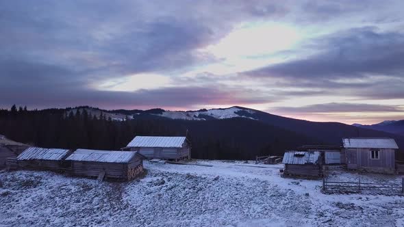 Flying Over Village of Shepherd and Winter Forest alt