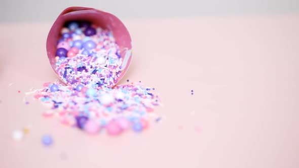 Colorful pink sprinkle blend on a pink background. alt