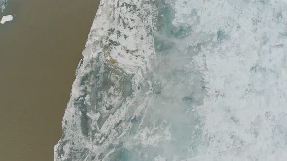 Frozen River with Exciting Patch of Open Water in Ice alt