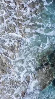 Vertical Video Sea Near the Coast  Closeup of the Coastal Seascape alt