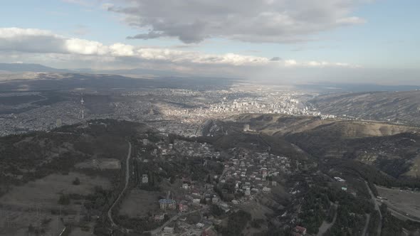 Aerial view of Okrokana district  with beautiful background of Tbilisi. Georgia alt