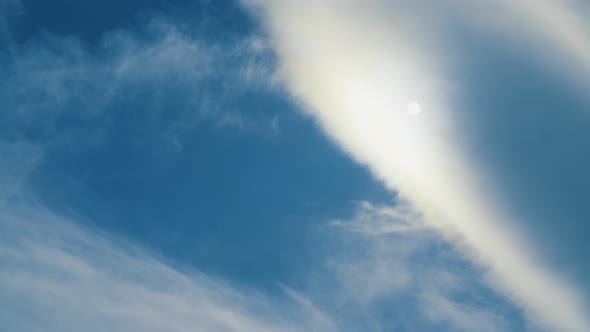 Lenticular Clouds Line In Front Of Sun Blue Sky Time Lapse Winter Storm Approaching alt