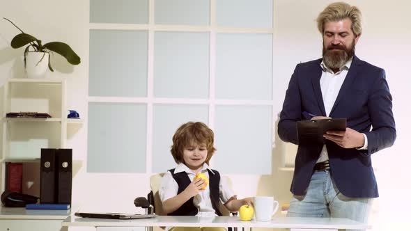 Little Boss. Businessman Bossy Child Working in Office. Marketing Team Meeting Brainstorming alt