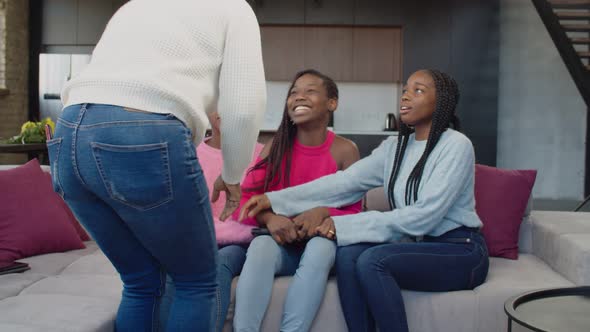 Mischievous Black Teenage Girls Watching Forbidden Online Content alt