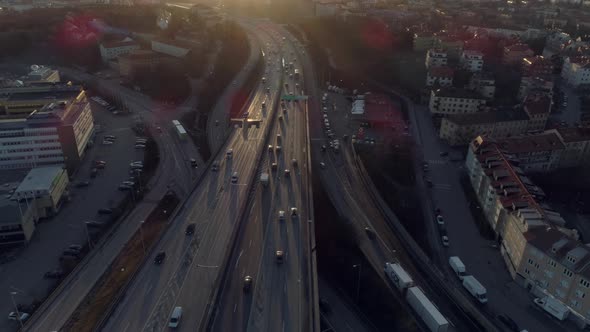 Aerial View of Elevated Highway Traffic at Sunset