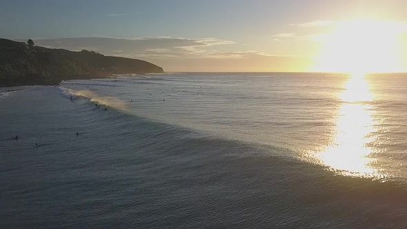 Surfing during sunset