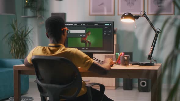 Black Designer Working with Chromakey alt