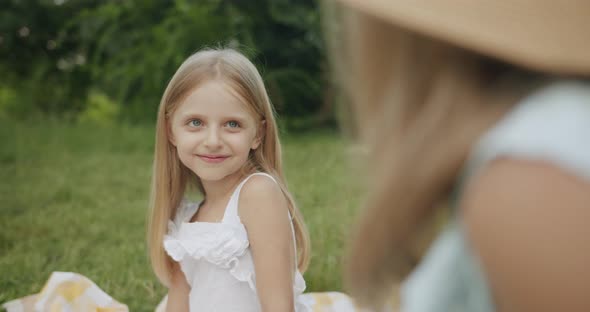 Portrait Cute Little Model Girl Smiling and Looks Beautiful to Sister and Camera alt