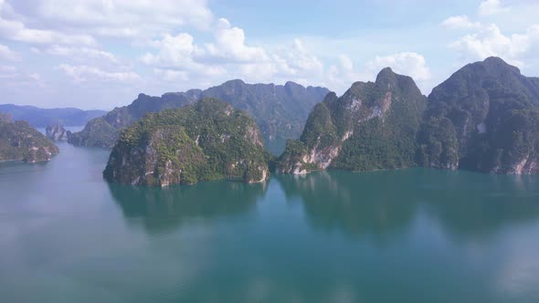 Aerial view landscape view Mountain in lake sky with cloud on lake water. Khao Sok Thailand alt