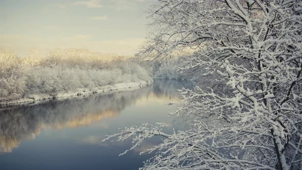 The First Day of Winter with Snow on the River