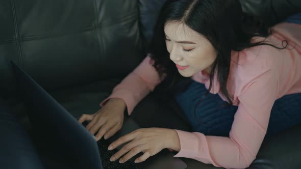 woman using laptop computer in the living room