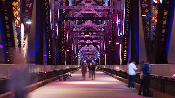 Pedestrian Bridge with Mood Lighting at Night
