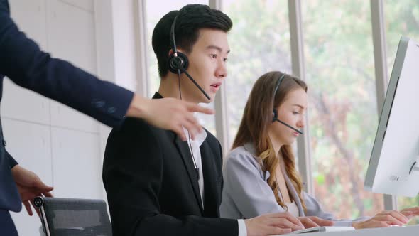 Business People Wearing Headset Working in Office alt