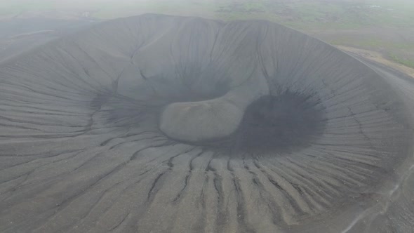 Flying in the clouds above Hverfjall volcano, Myvatn, Iceland alt
