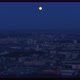 Aerial view of the huge moon above the night city. - VideoHive Item for Sale