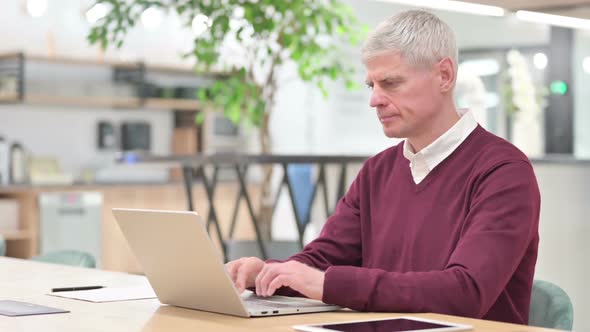 Hardworking Middle Aged Man Having Headache alt