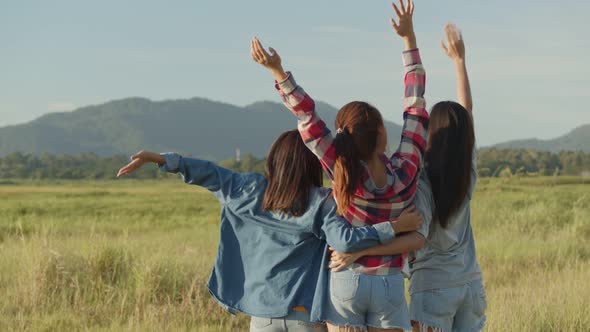 Group of a young Asian women looks to view the mountain and having fun together.