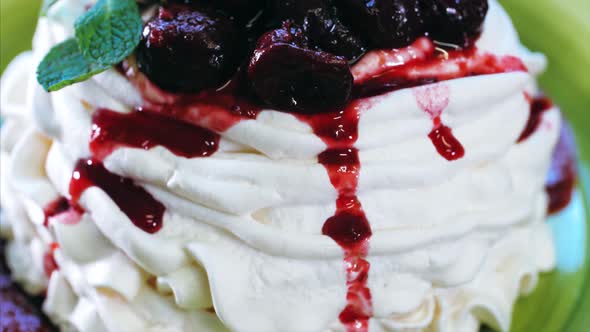Meringue Cake with Cream and Cherry Jam Closeup