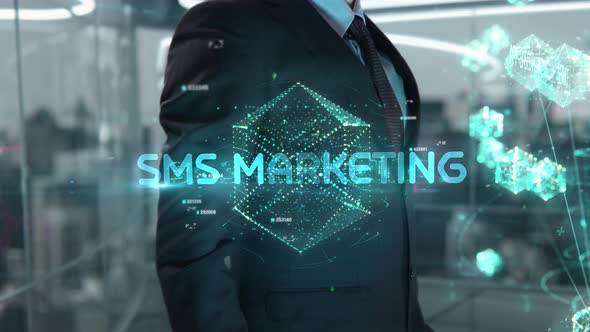Businessman with SMS Marketing Hologram Concept alt