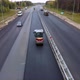 Reconstruction, repair of intercity motorway with heavy traffic. Drone footage - VideoHive Item for Sale