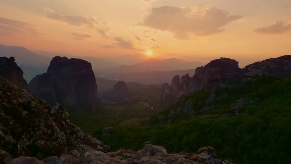 Aero, Timelapse. Sunset in the Mountains Meteors in Greece. Ancient Monasteries Are on Tops of alt