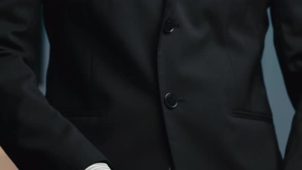 Well Dressed Man Prepares to Fight alt