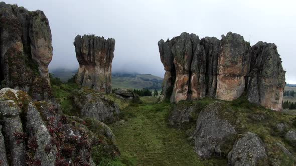 Los Frailones Rock Formations On The Green Plains At The Hill Of Cumbemayo In Cajamarca, Peru. aeria alt