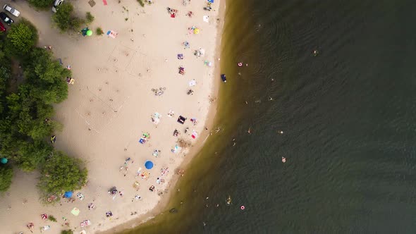 Aerial View From Drone on People Having a Rest on the River Bank in Summer alt