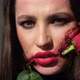 Glamorous Brunette Woman with Makeup for Halloween Rose Flower in Her Mouth - VideoHive Item for Sale