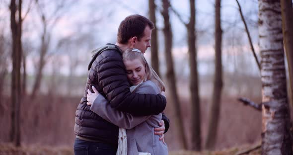 Young People Hugs in the Autumn Forest alt