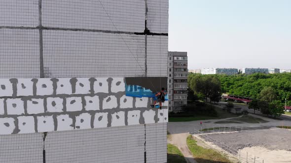 Aerial, Industrial Climber for Insulated Facades Putty Cement on Fiberglass Mesh alt