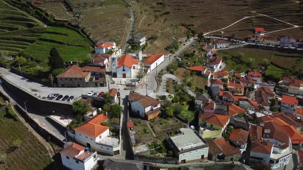 drone footage of a beautiful village near porto in the douro valley in portugal alt