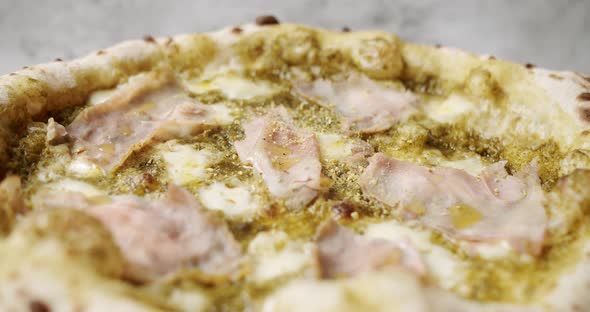 Pizza with Meat Pesto Cheese and Parmesan Fresh Out of the Oven Ready to Eat alt