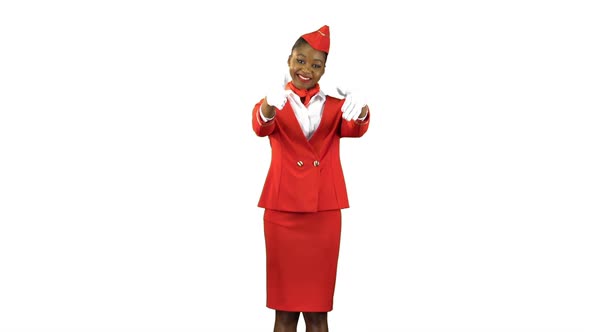 Stewardess in White Gloves Gestures Showing Where the Emergency Exit Is. Alpha Channel alt