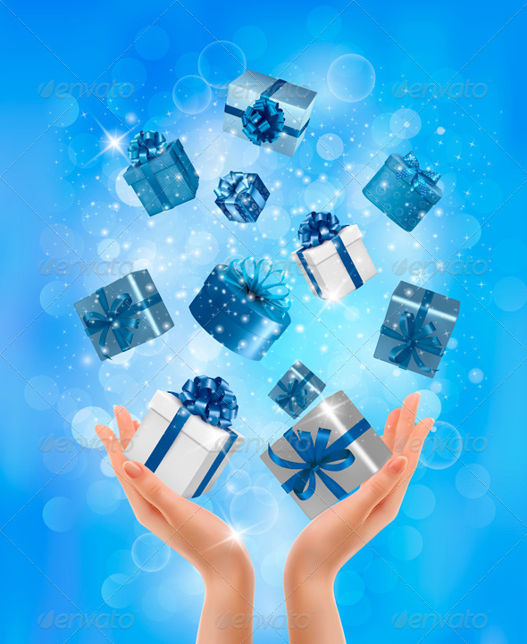 Holiday Background with Hands holding Gift Boxes. - Christmas Seasons/Holidays