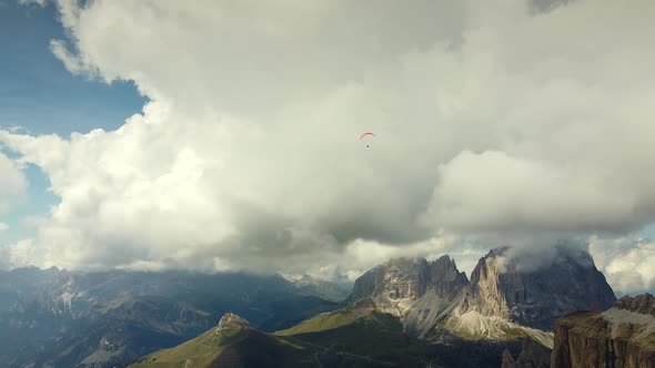 Paragliding in the Sky Over Italian Dolomites alt