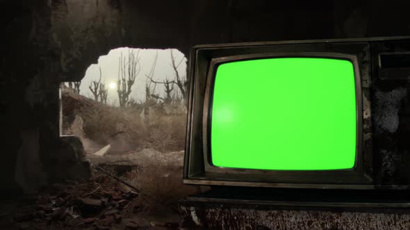 Old Retro TV Set with Green Screen in the Room of a Ruined House. 4K Version.