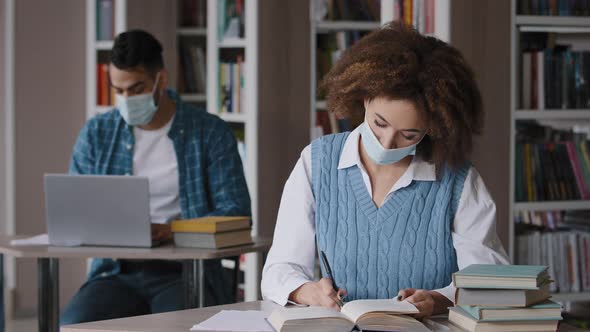 Students Study in Library in Protective Mask Comply with Quarantine Measures Young Clever Girl alt