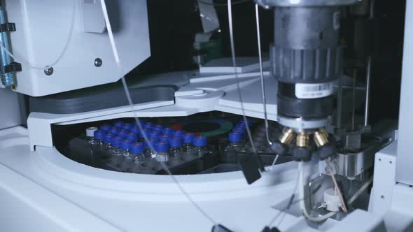 Close Up Auto Sampler Collects Sample for HPLC Analysis alt
