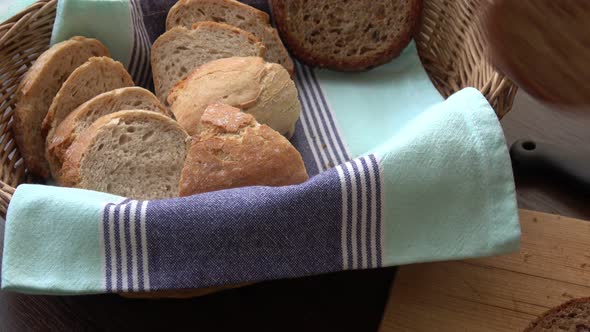 Basket with fresh bread. Sliced bread.